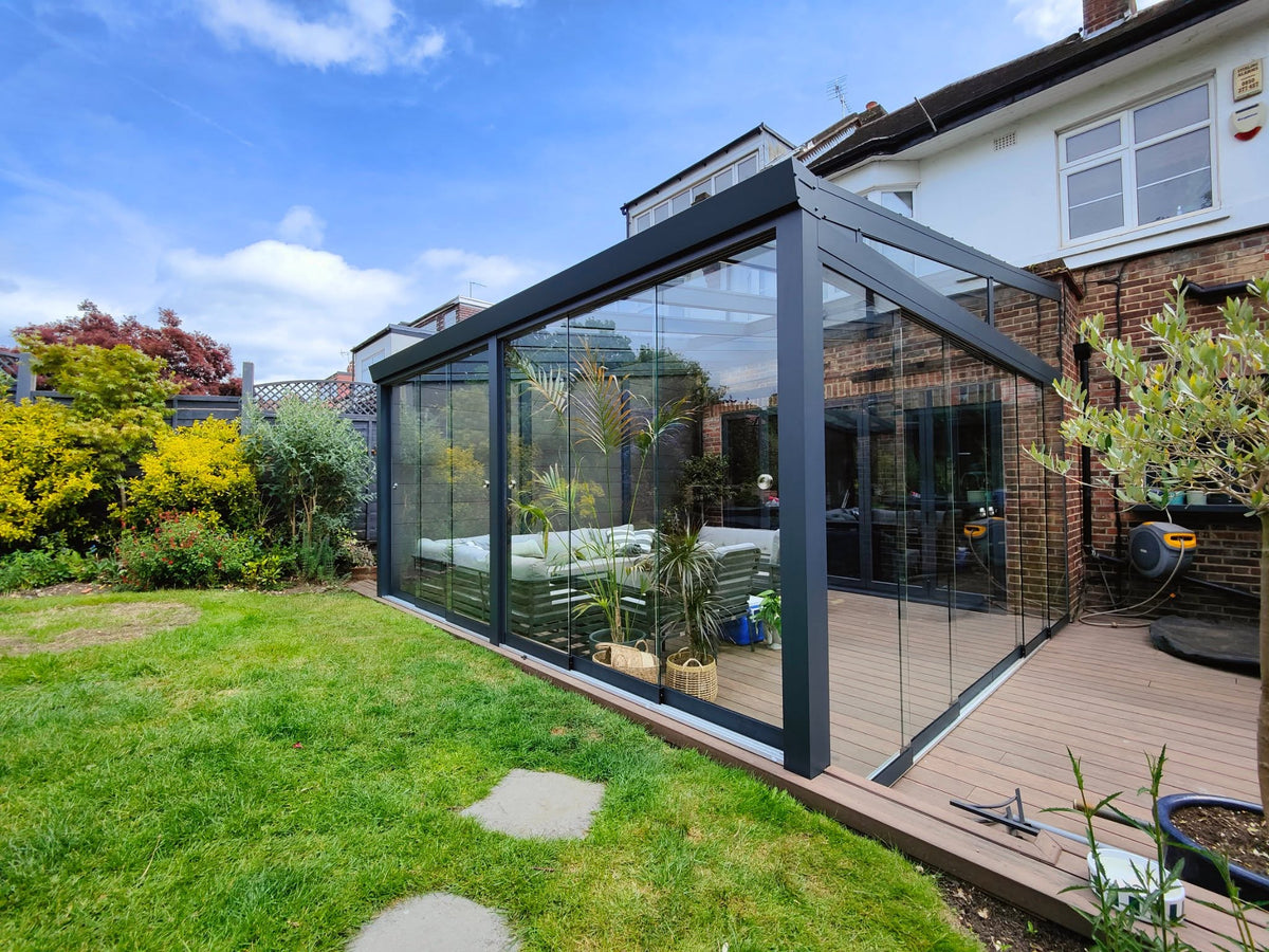 Lean - to wall glass room